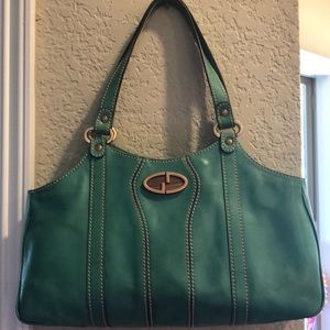 Authentic Gucci Turquoise purse.